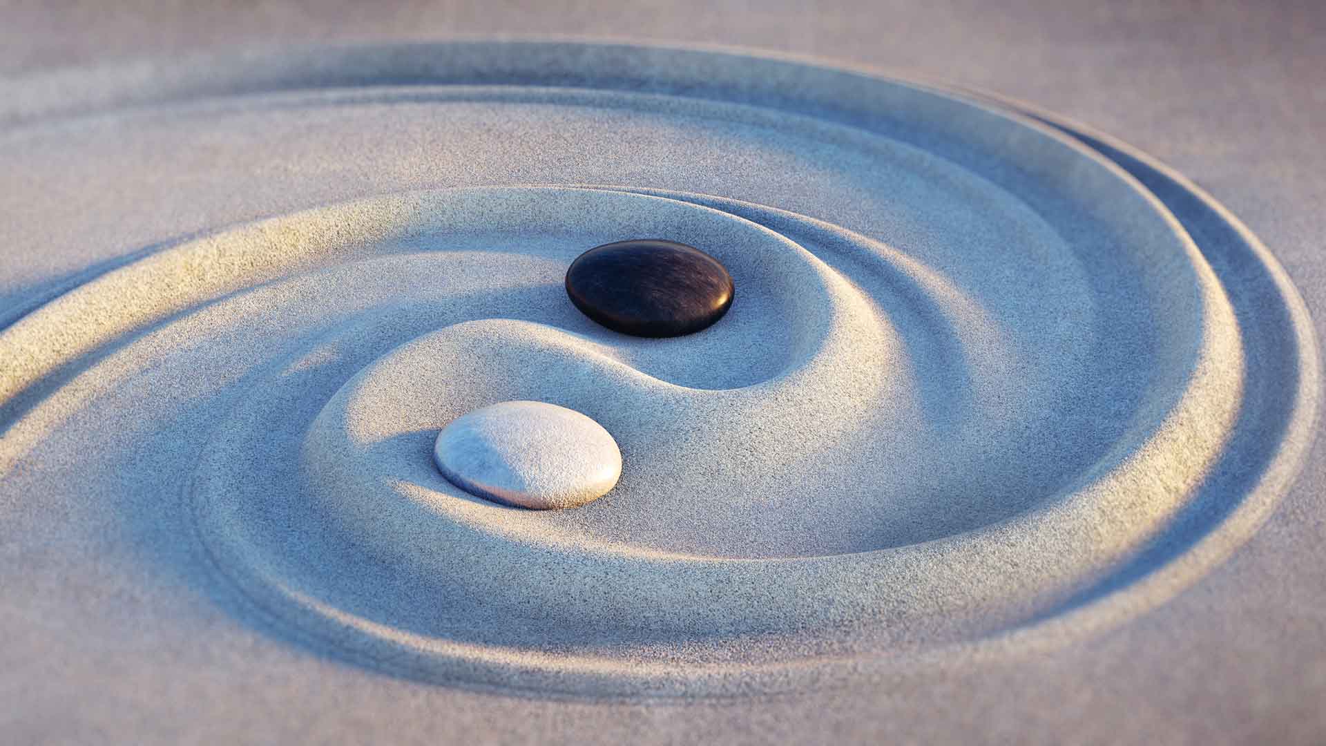 Stones and sand in yin yang pattern