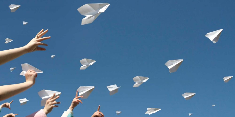 flying paper airplanes